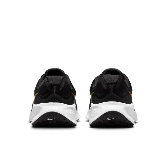 Women's Wide Fit Nike FZ6829-002 Revolution 7 Trainers in Black/White/Metallic Gold - Image 1