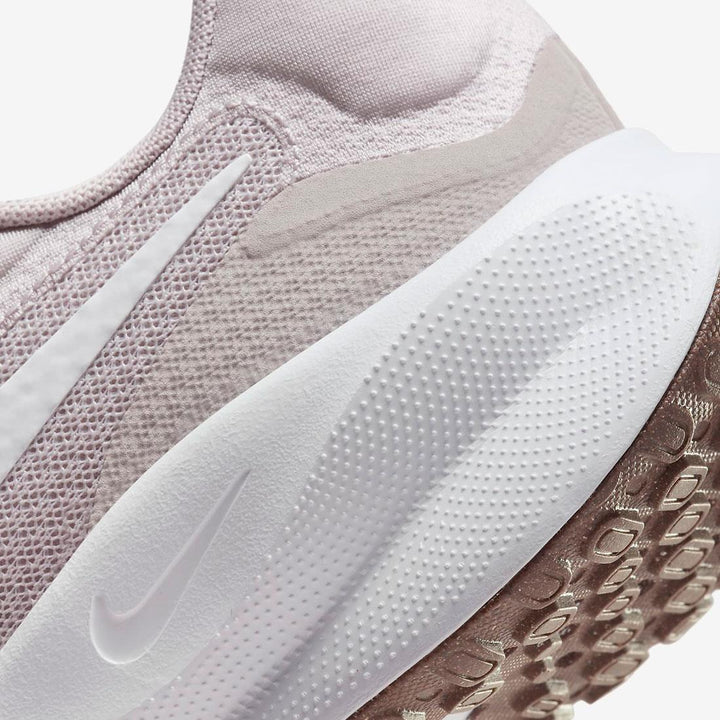 Women's Wide Fit Nike FZ6829-007 Revolution 7 Trainers in Mauve/White - Image 1