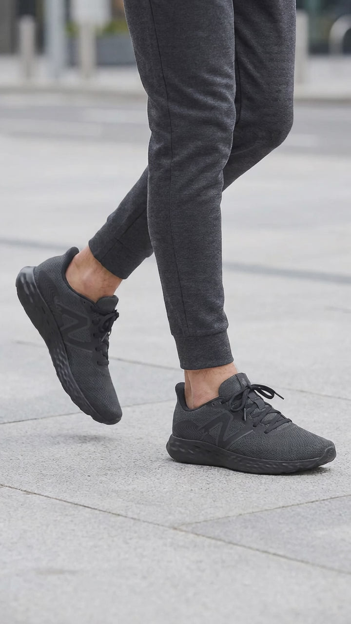 Men's Wide Fit New Balance 411V3 Running Trainers in Black - Image 1