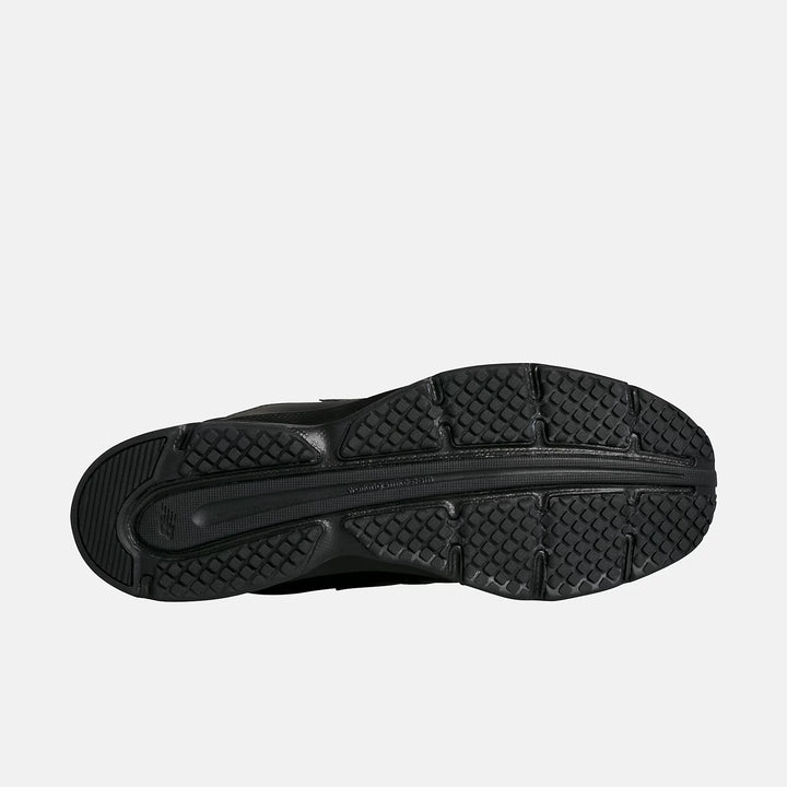 Mens Wide Fit New Balance MW411BK2 Trainers in Black - Image 1
